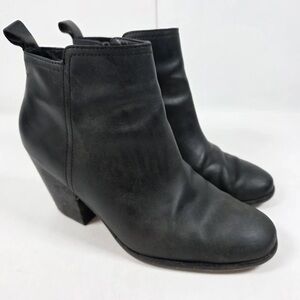 Chic Black Leather Heeled Boots